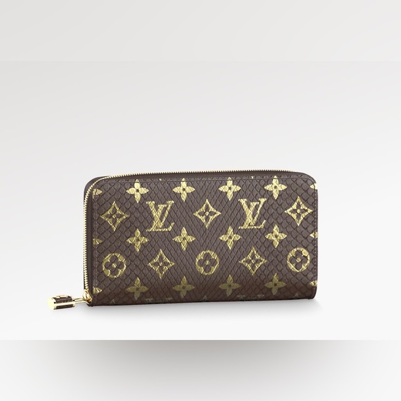 Louis Vuitton Handbags - EUC PYTHON SKIN LOUIS VUITTON ZIPPY WALLET